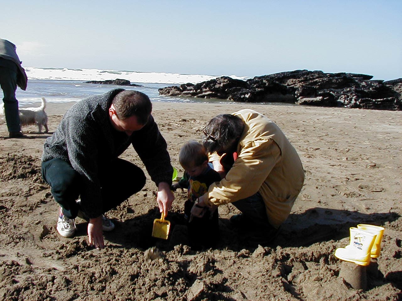 David, Roge and Ethan, making sand castles on Trevone beach, Cornwall