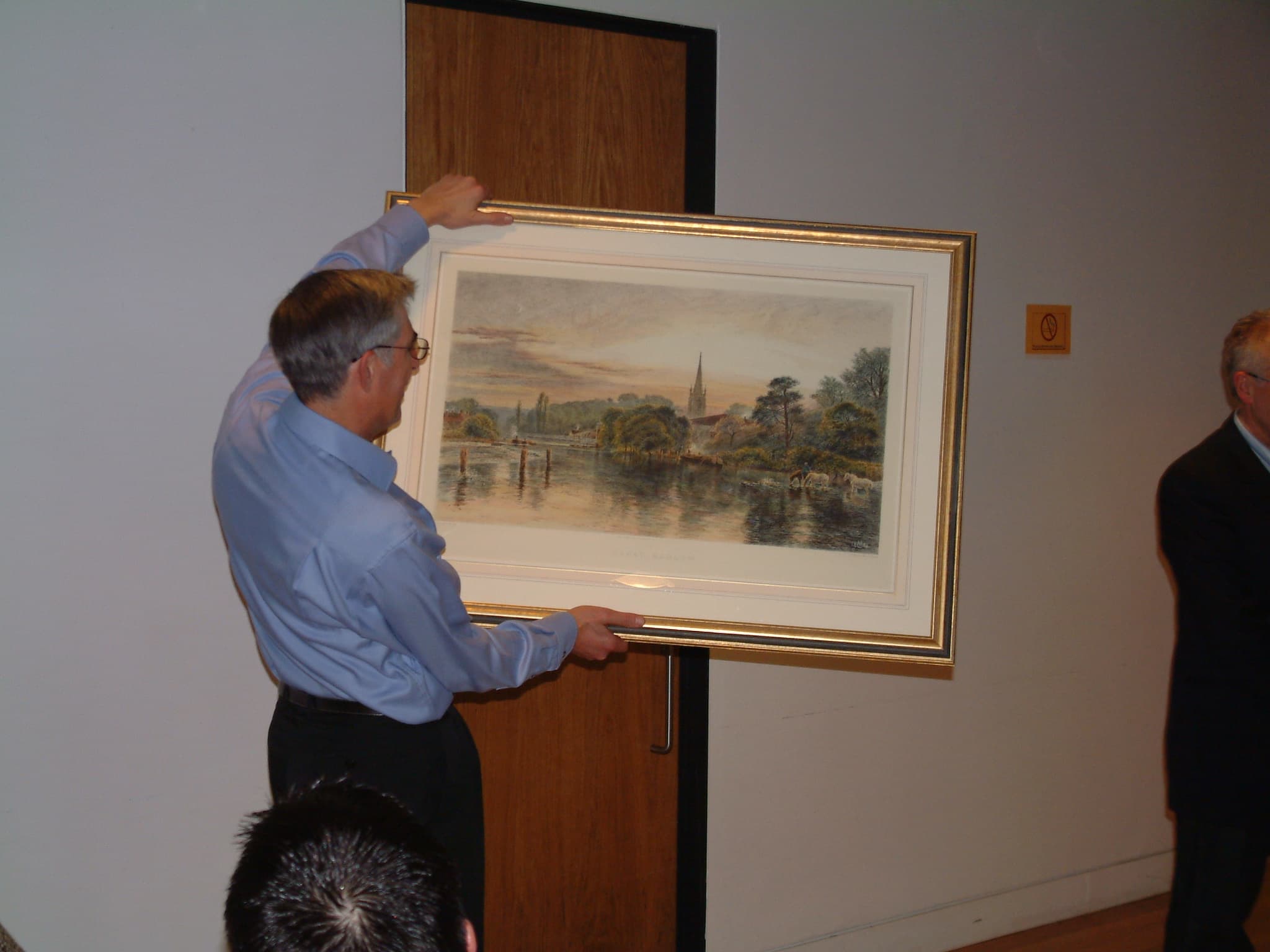 David receiving his retirement gift
