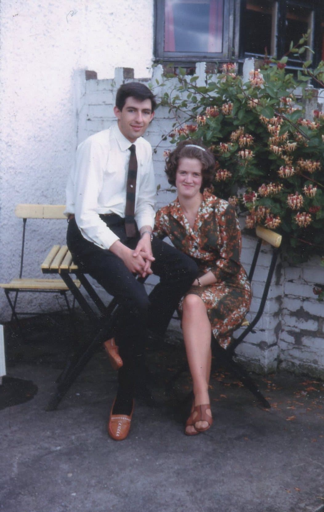 David and Heather Balston sitting on the patio